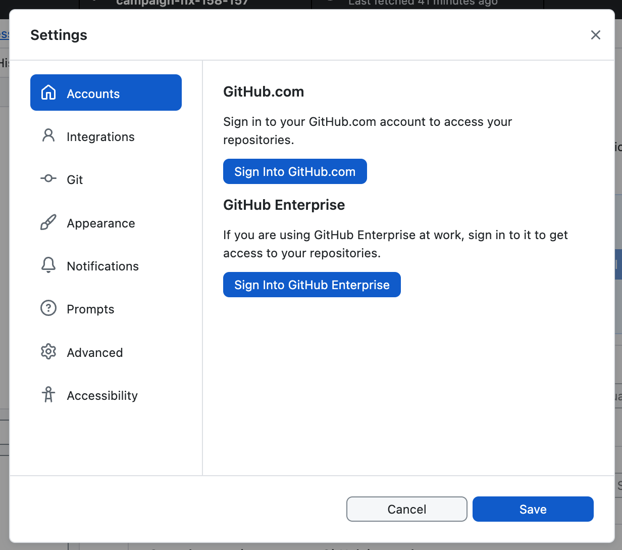 Captura de tela do painel “Contas” na janela “Configurações”. Botões azuis rotulados “Entrar no GitHub.com” e “Entrar no GitHub Enterprise” são mostrados.