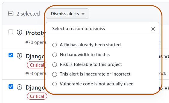 Screenshot of a list of alerts. Below the "Dismiss alerts" button, a dropdown labeled "Select a reason to dismiss" is expanded.